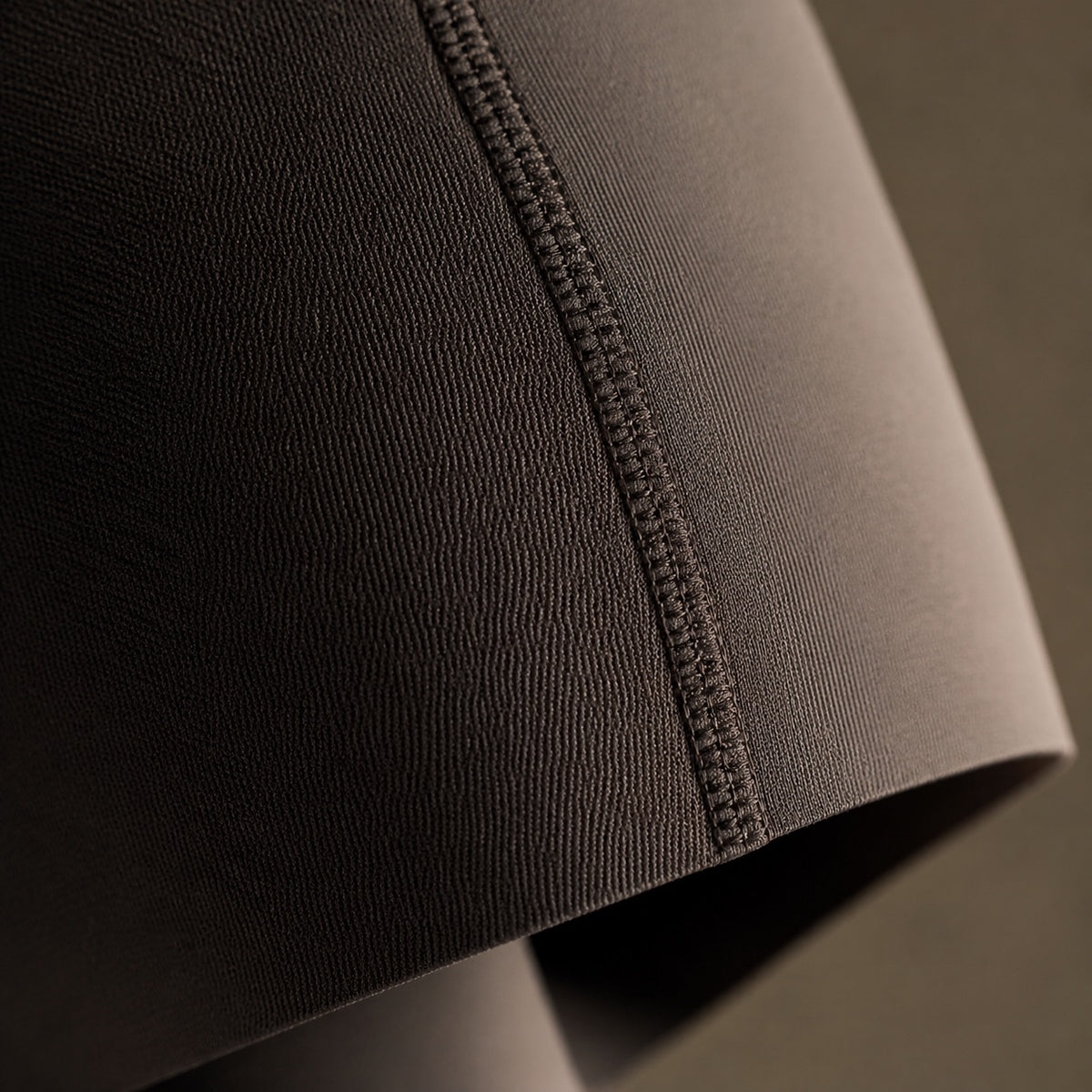 Puttenham high-waist cycle short, Cycle Shorts and Leggings — close-up of the cloth and stitching.