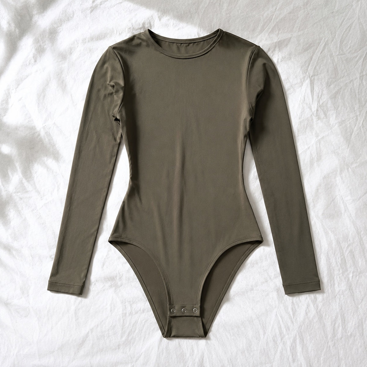 Moor Park long-sleeve base layer bodysuit, Long-Sleeve Base Layers — front view, photographed flat.