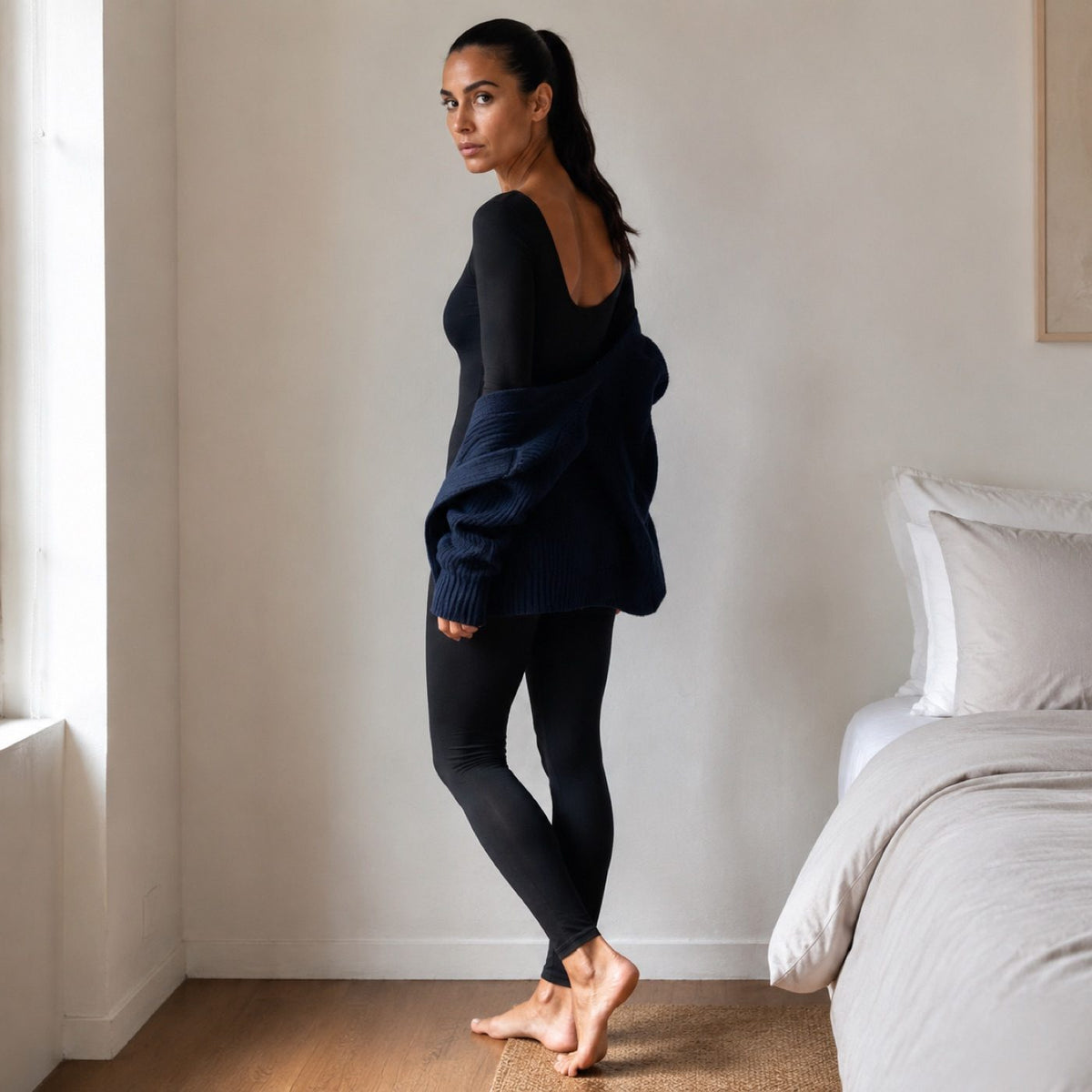 Bourne long-sleeve base layer bodysuit, Long-Sleeve Base Layers — modelled, side view.