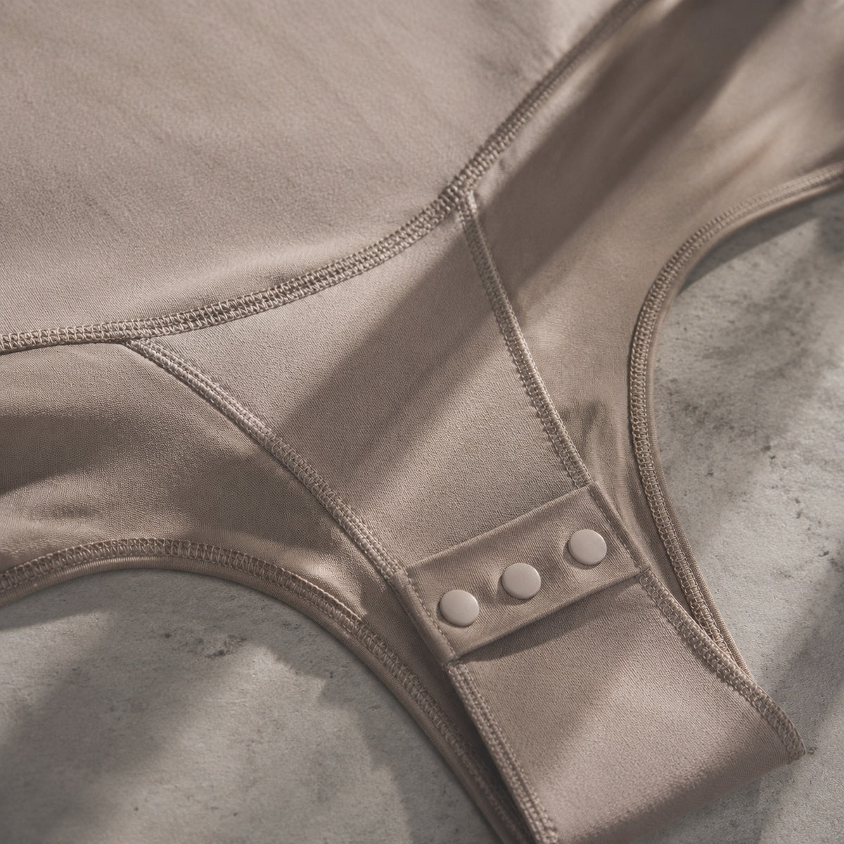 Tilford long-sleeve base layer bodysuit, Long-Sleeve Base Layers — close-up of the cloth and stitching.