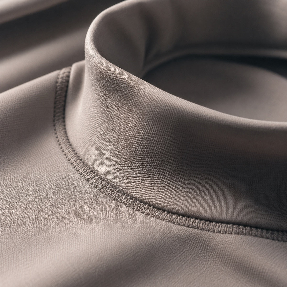 Puttenham high-neck long-sleeve base layer, Long-Sleeve Base Layers — close-up of the cloth and stitching.