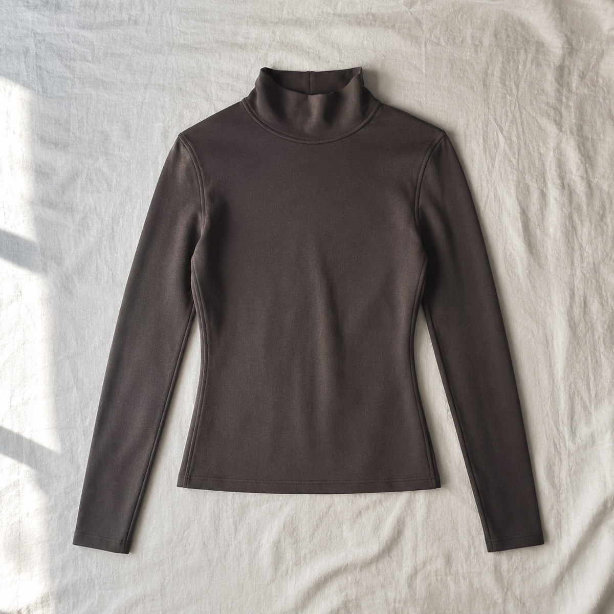 Puttenham high-neck long-sleeve base layer, Long-Sleeve Base Layers — front view, photographed flat.
