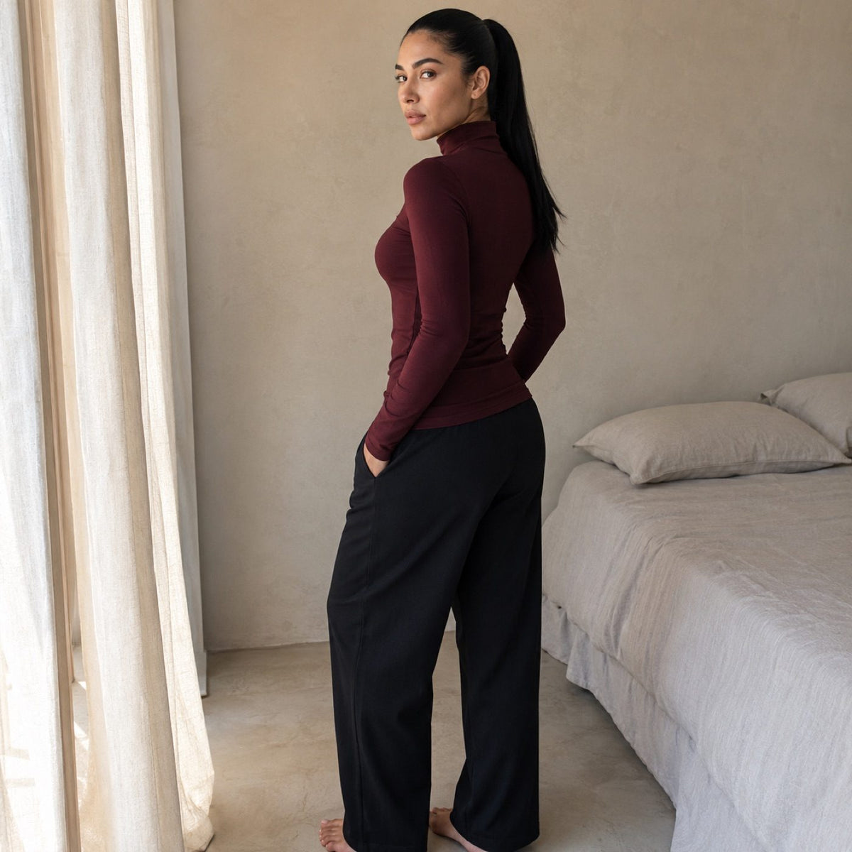 Wrecclesham high-neck long-sleeve base layer, Long-Sleeve Base Layers — on the model.