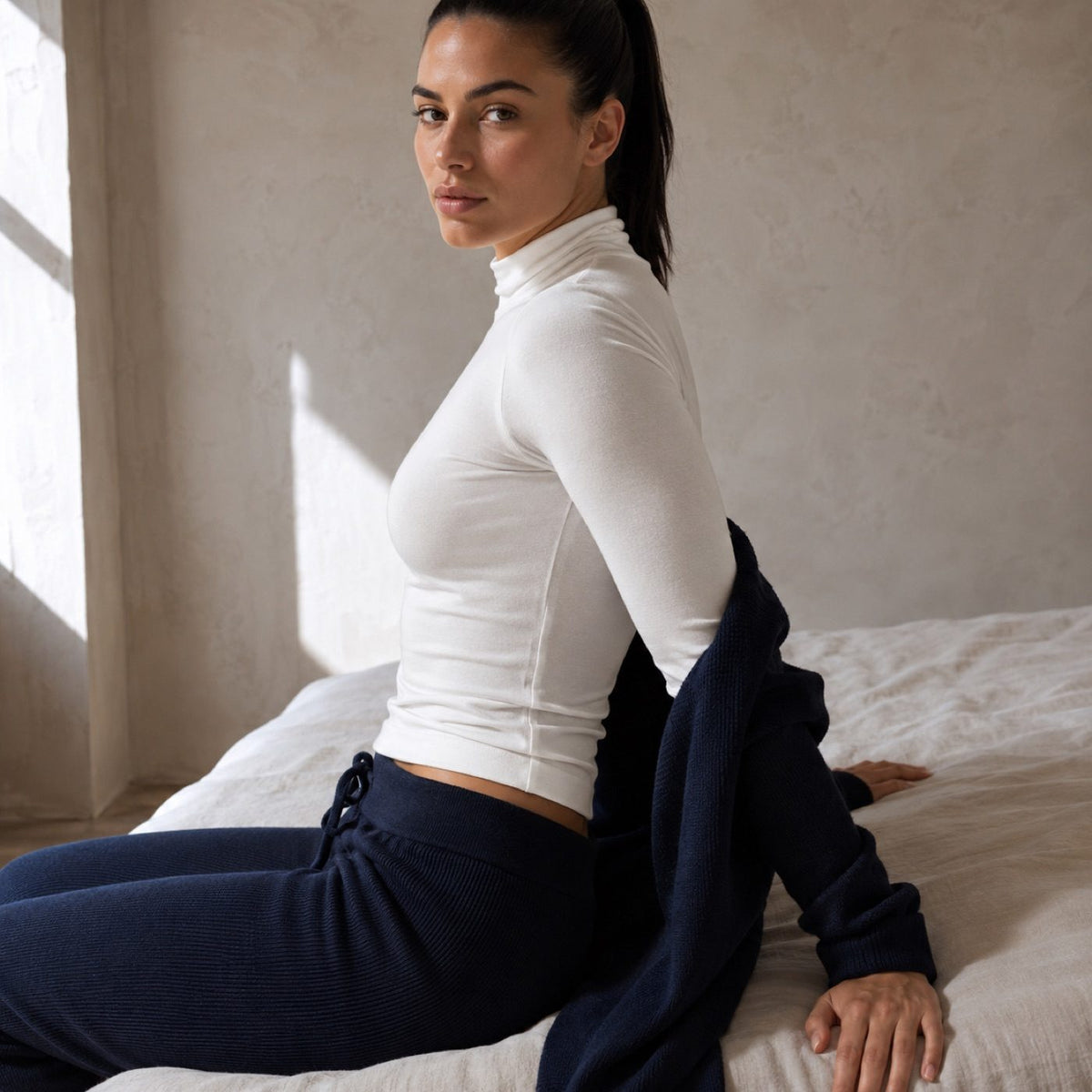 Dockenfield high-neck long-sleeve base layer, Long-Sleeve Base Layers — modelled, side view.