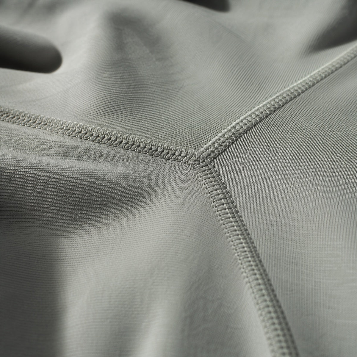 Hale long-sleeve base layer bodysuit, Long-Sleeve Base Layers — close-up of the cloth and stitching.