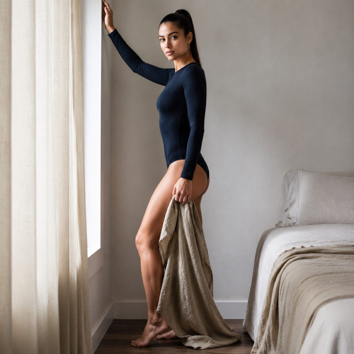 Hale long-sleeve base layer bodysuit, Long-Sleeve Base Layers — modelled, side view.