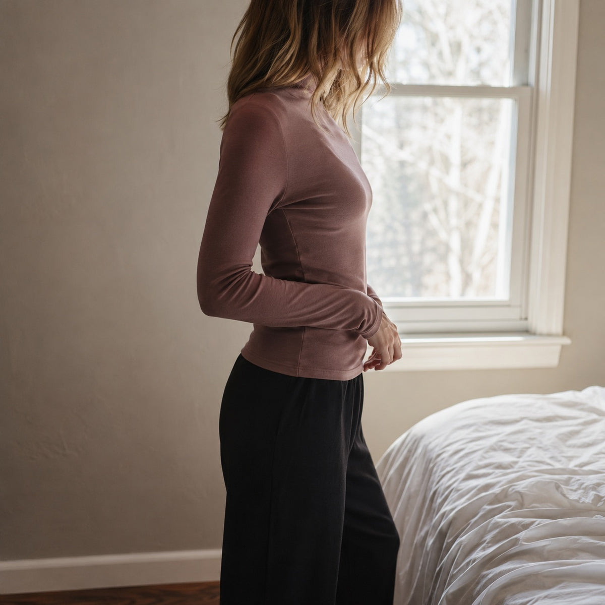 Elstead high-neck long-sleeve base layer, Long-Sleeve Base Layers — modelled, side view.