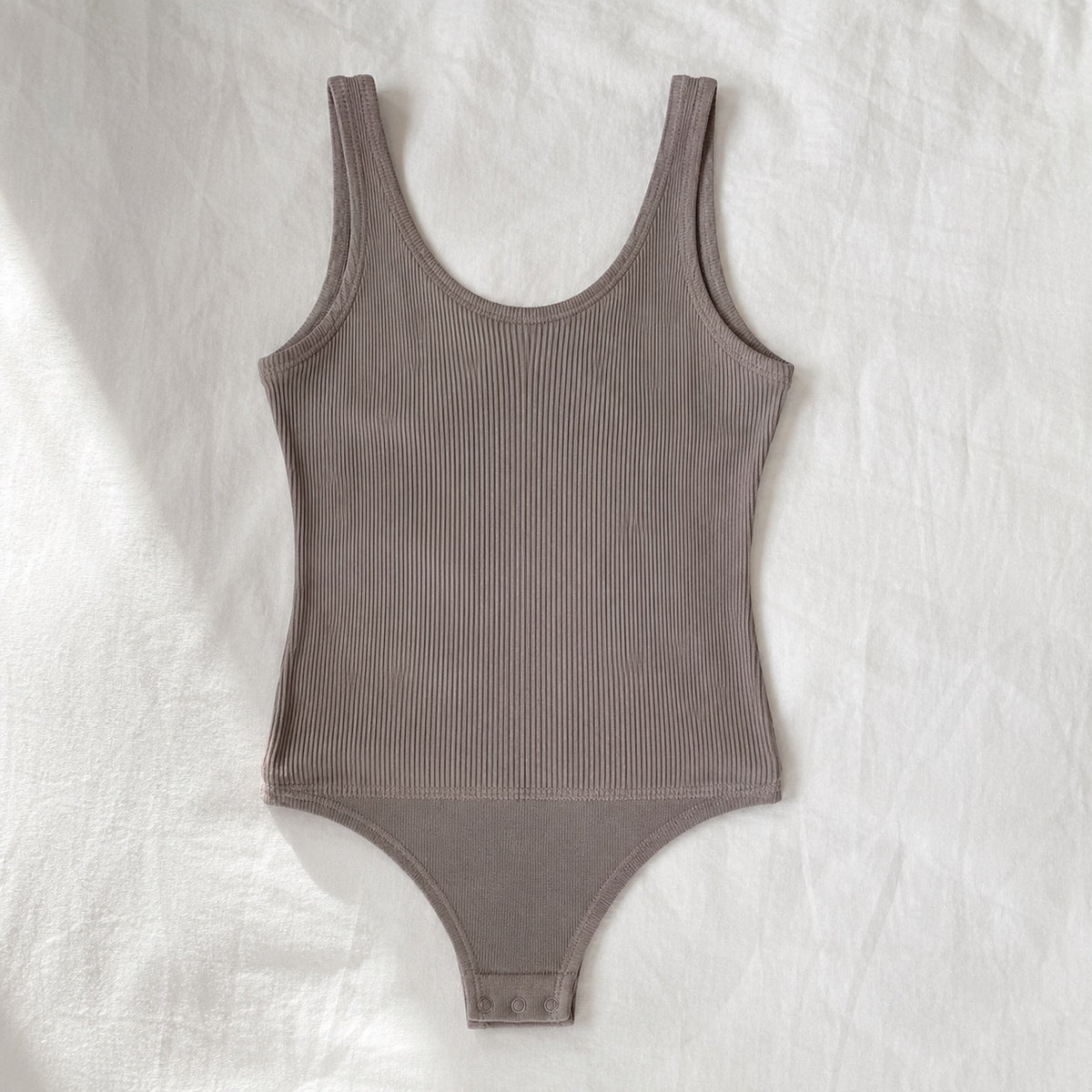 Runfold ribbed scoop-back tank, Rib Body Layers — front view, photographed flat.