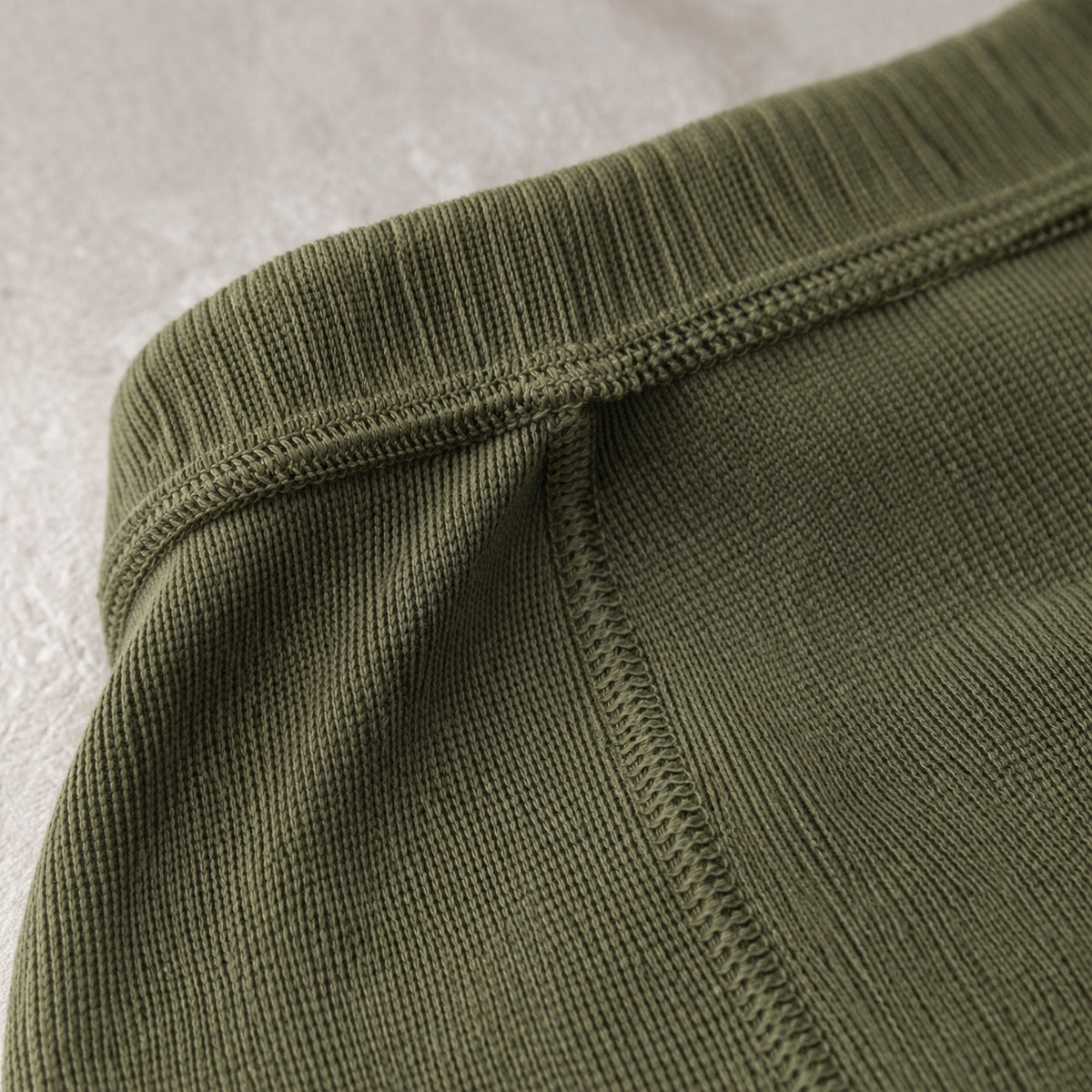 Badshot seamless knee-length skirt, Seamless Layers — close-up of the cloth and stitching.