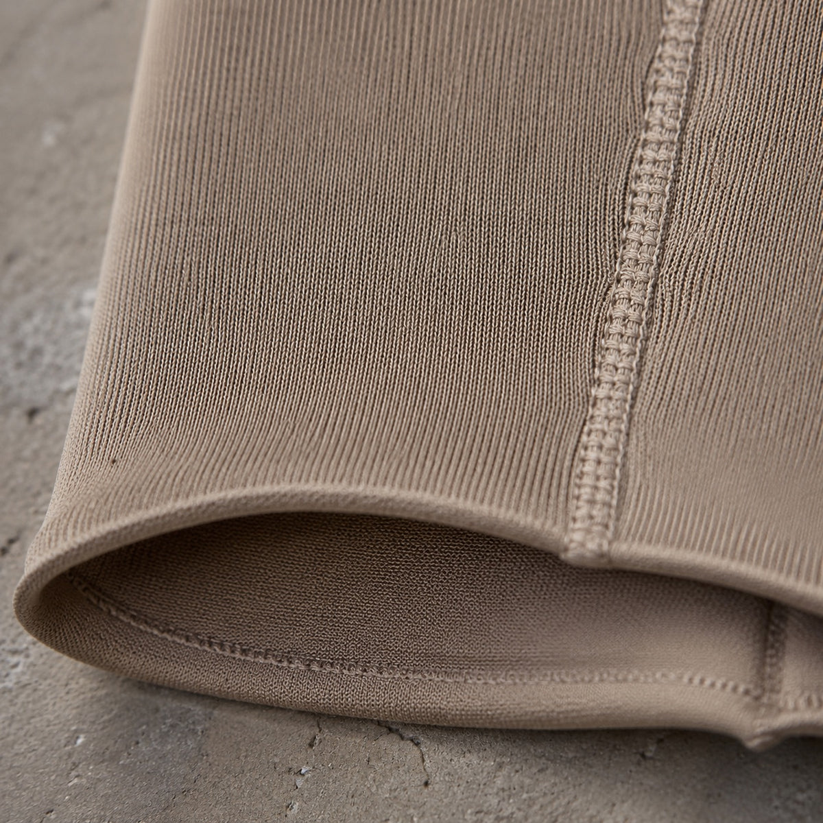 Moor Park seamless knee-length skirt, Seamless Layers — close-up of the cloth and stitching.