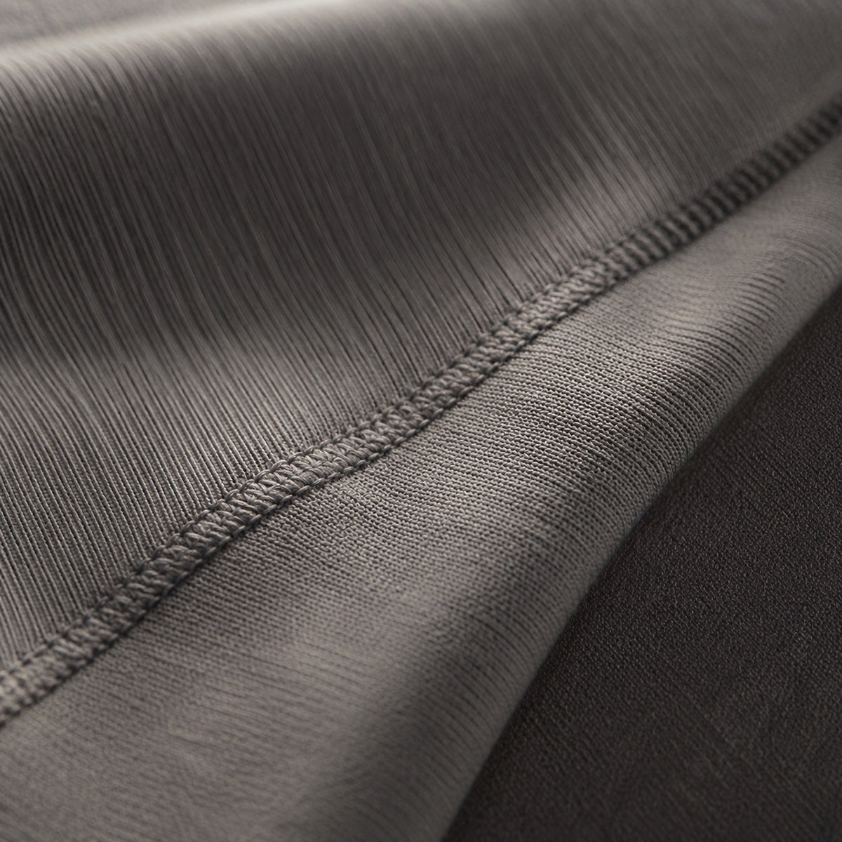Bourne seamless knee-length skirt, Seamless Layers — close-up of the cloth and stitching.