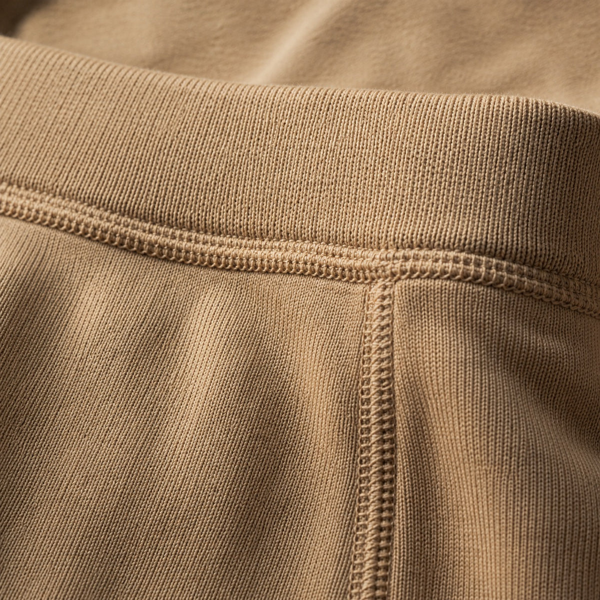 Seale seamless knee-length skirt, Seamless Layers — close-up of the cloth and stitching.