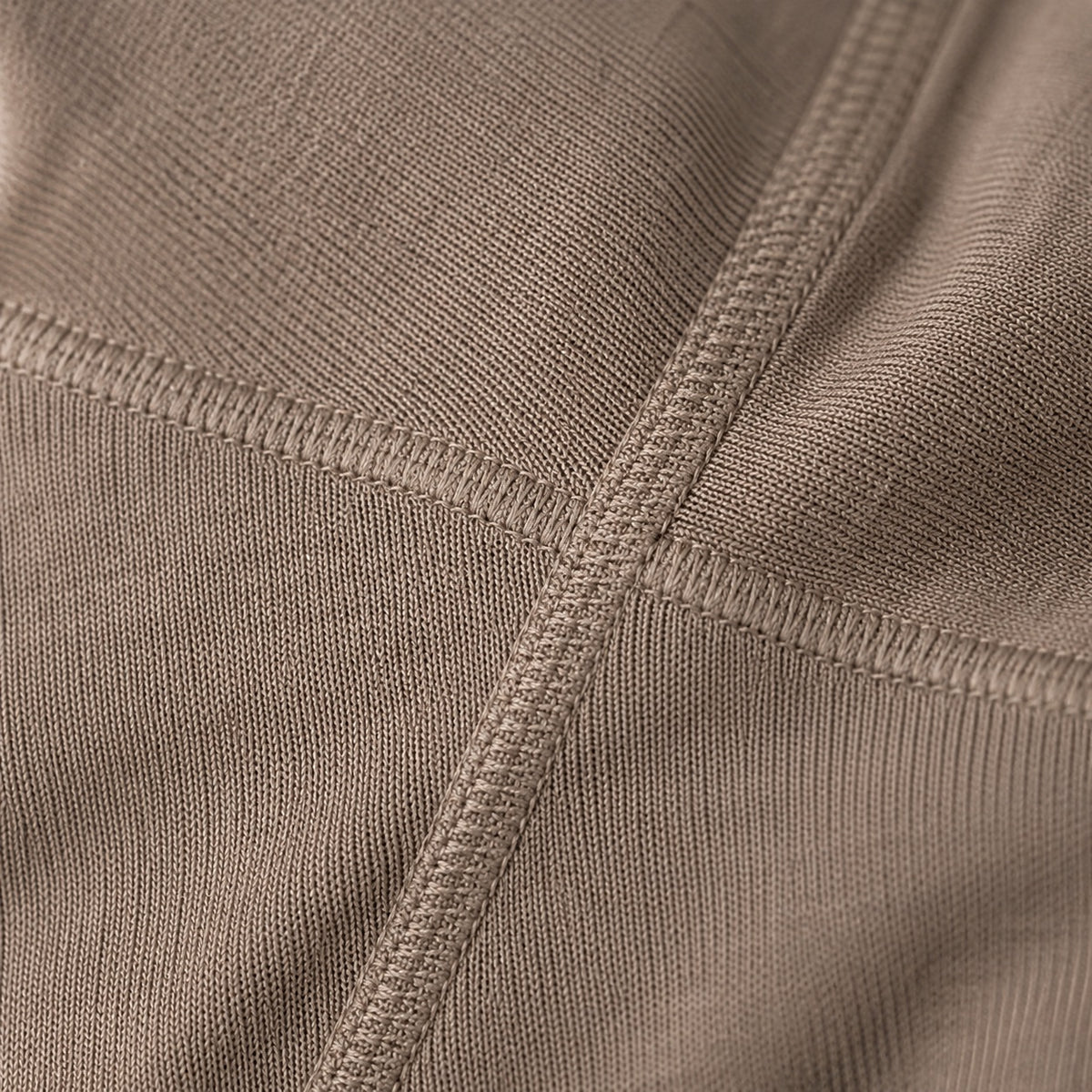 Frensham seamless knee-length skirt, Seamless Layers — close-up of the cloth and stitching.