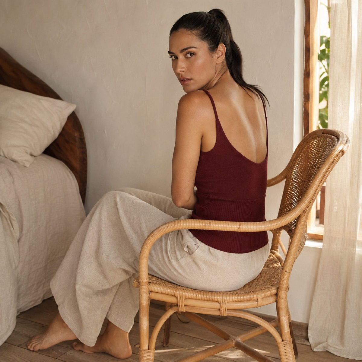 Crondall seamless knee-length skirt, Seamless Layers — modelled, side view.