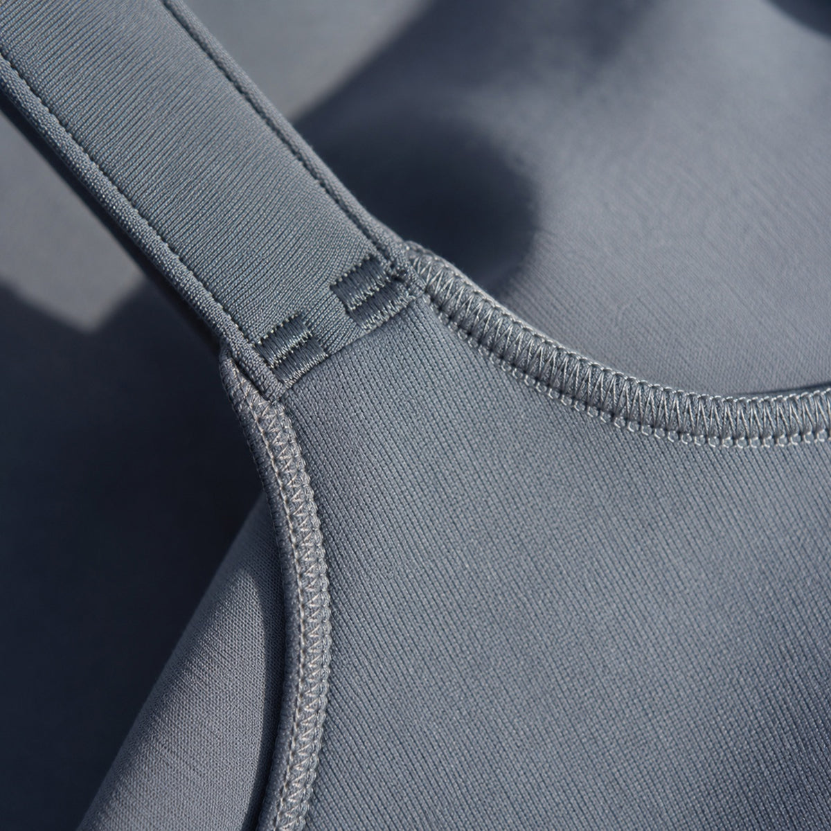 Tilford sculpt tank, Sculpt Tanks — close-up of the cloth and stitching.